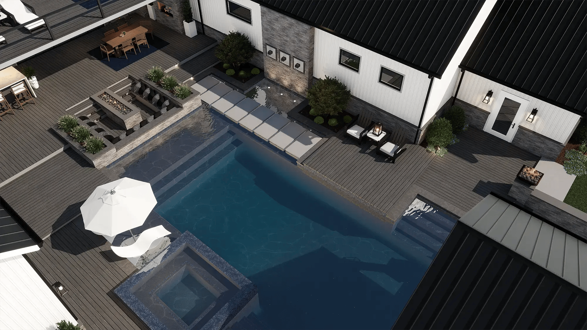 Custom pool deck with stone coping, raised wall, and integrated water features