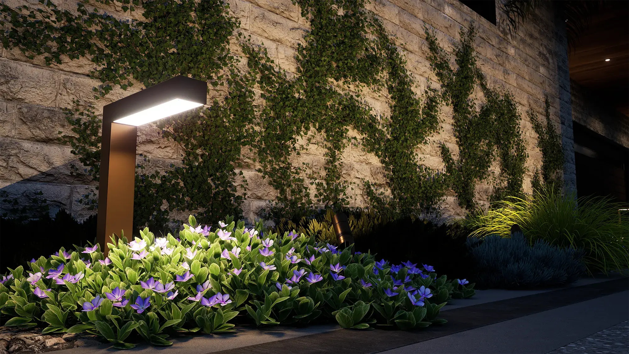 Landscape design with layered planting, stone retaining walls, and integrated outdoor lighting in a modern backyard